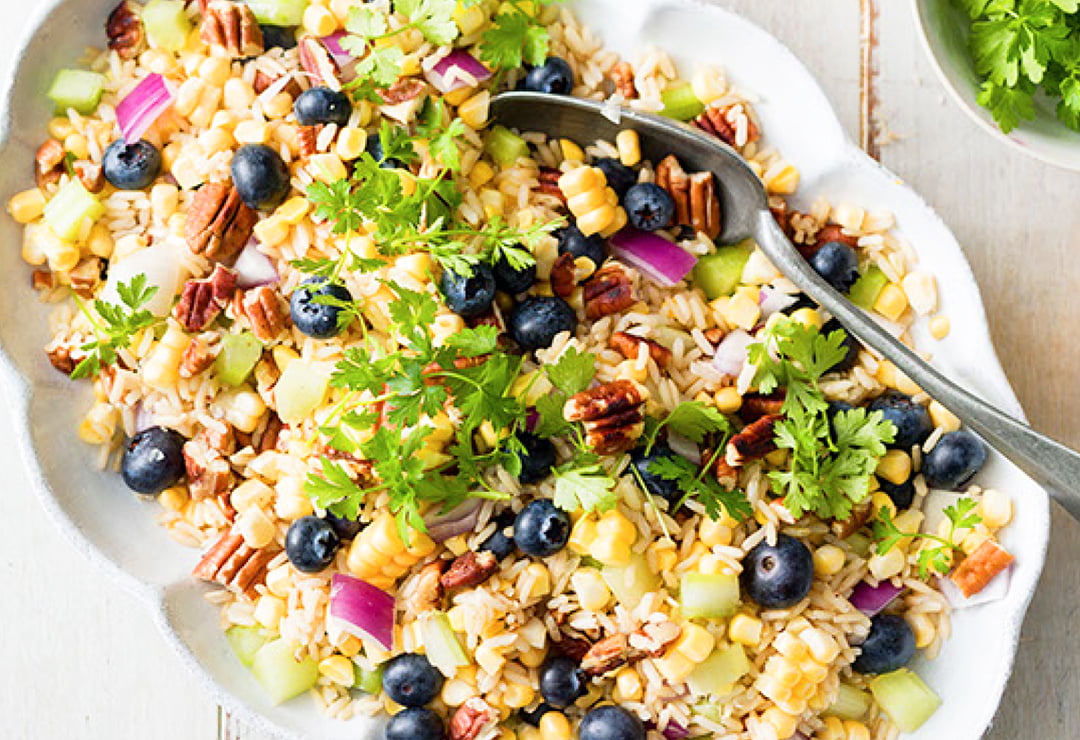 Rice and sweetcorn salad with blueberries and pecans